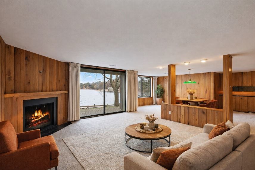 25 Shoreline Road, Unit D Lake Barrington, IL 60010 - Photo 22 of 43 a living room with furniture and a fireplace