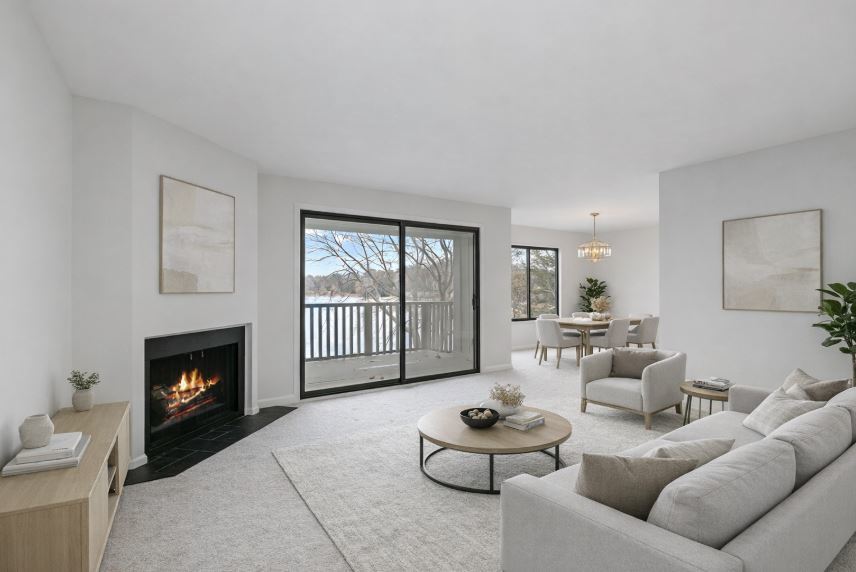 25 Shoreline Road, Unit D Lake Barrington, IL 60010 - Photo 6 of 43 a living room with furniture and a fireplace