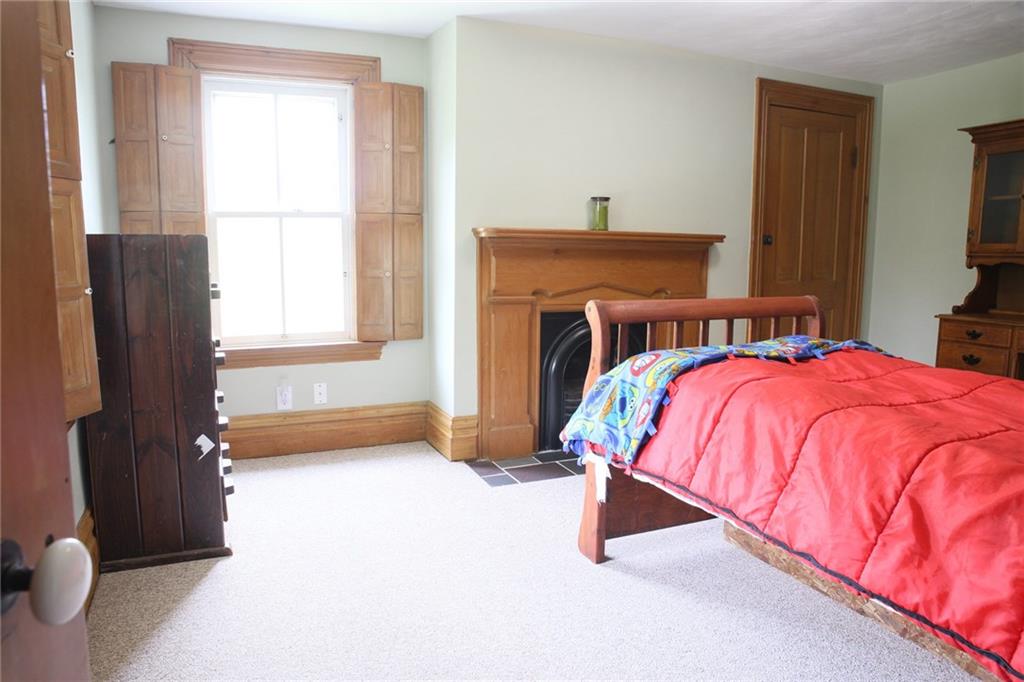 3990 Remaley Road Murrysville, PA 15668 - Photo 19 of 25 Decorative fireplace in bedroom with large closets