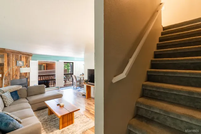 a view of living room filled with furniture
