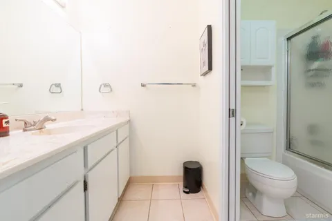 a outdoor living space with patio furniture and a fireplace