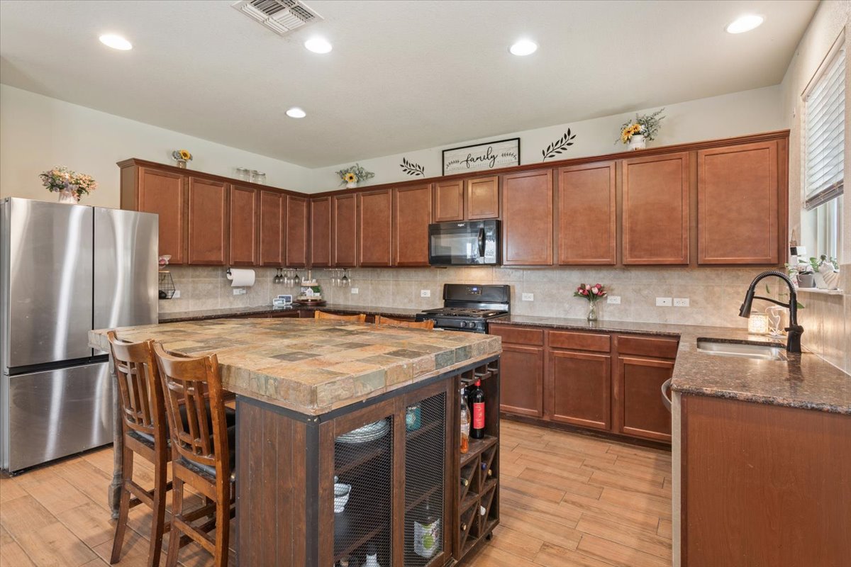 1500 Cliffbrake Way Georgetown, TX 78626 - Photo 13 of 35 Custom-built island.