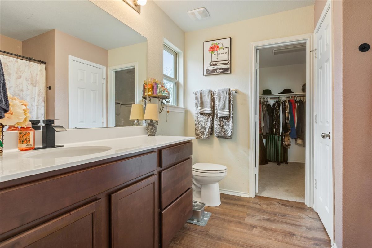 1500 Cliffbrake Way Georgetown, TX 78626 - Photo 23 of 35 Primary bathroom and walk-in closet