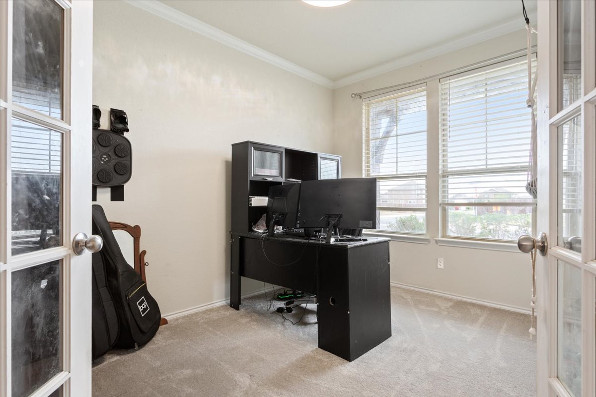 1500 Cliffbrake Way Georgetown, TX 78626 - Photo 5 of 35 Office with ornamental molding, new carpet, and french doors