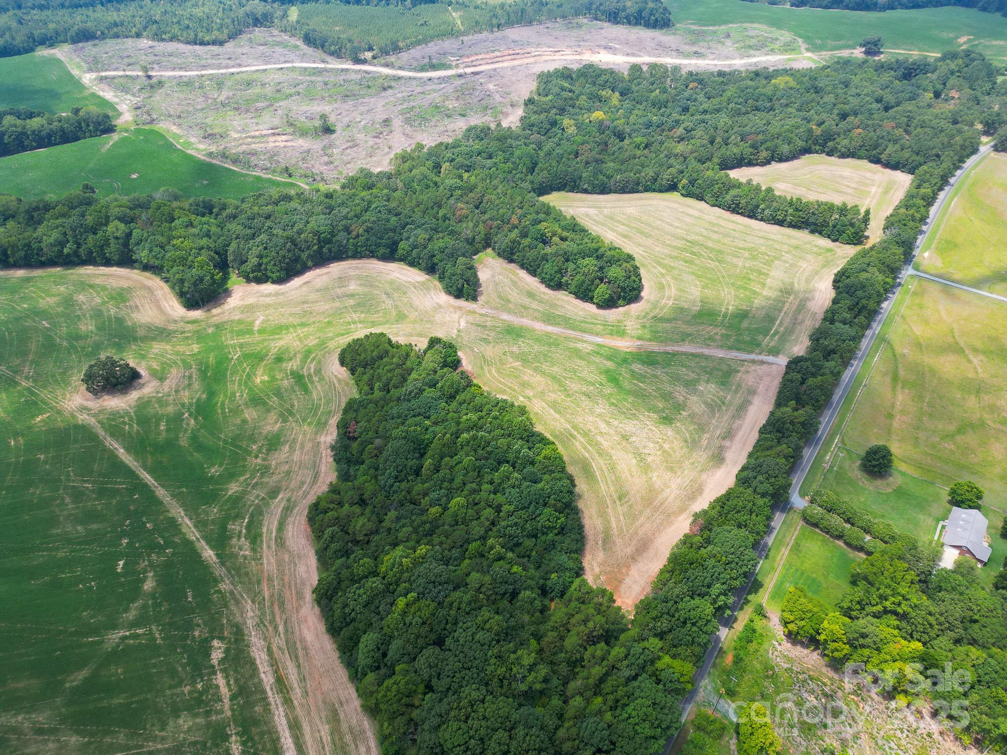 7602 Gus Eubanks Road Monroe, NC 28112 - Photo 11 of 22 a view of a garden in a backyard