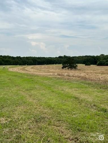 7602 Gus Eubanks Road Monroe, NC 28112 - Photo 21 of 22 a view of an ocean and beach