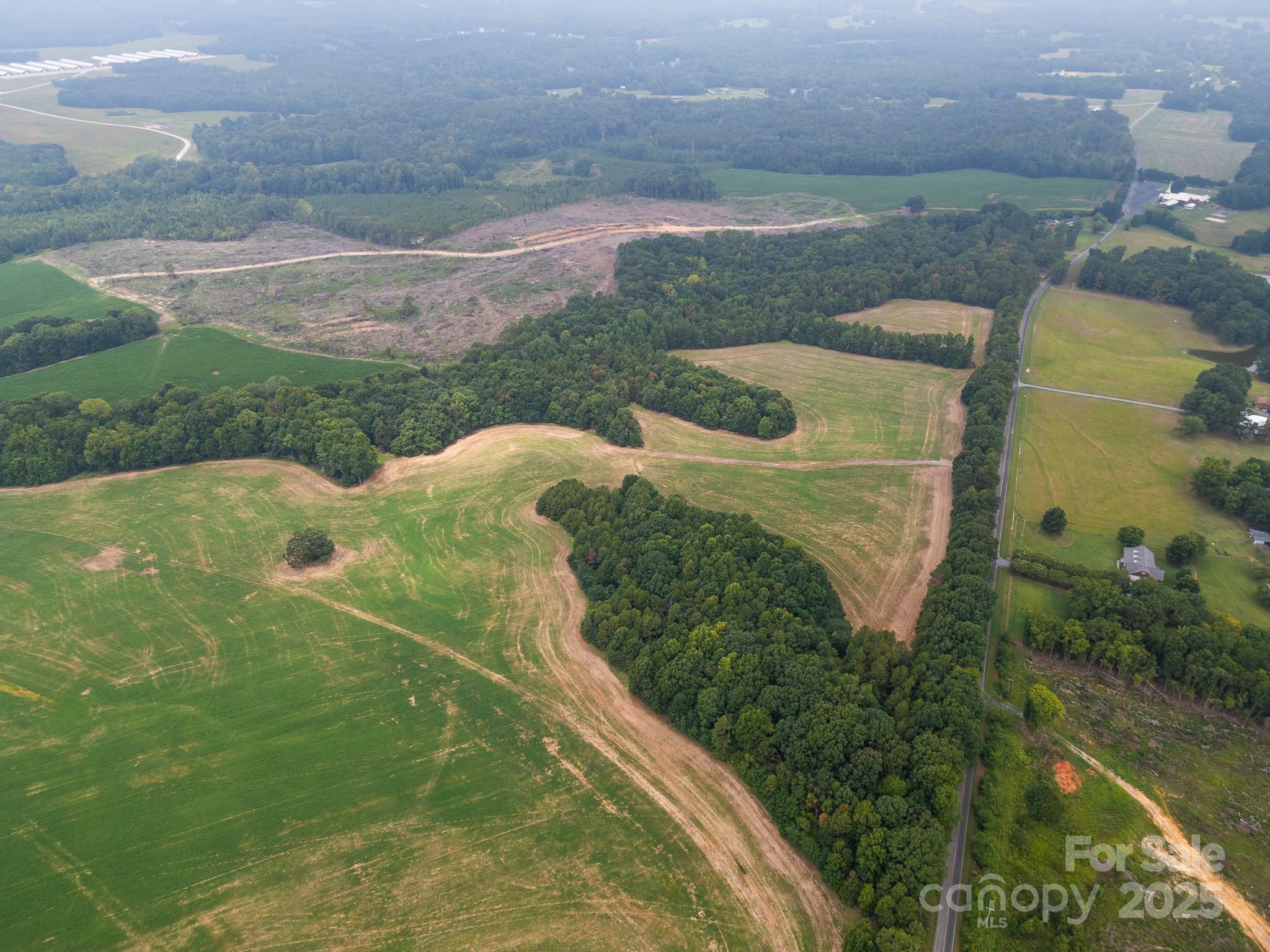7602 Gus Eubanks Road Monroe, NC 28112 - Photo 3 of 22 a view of outdoor space and garden
