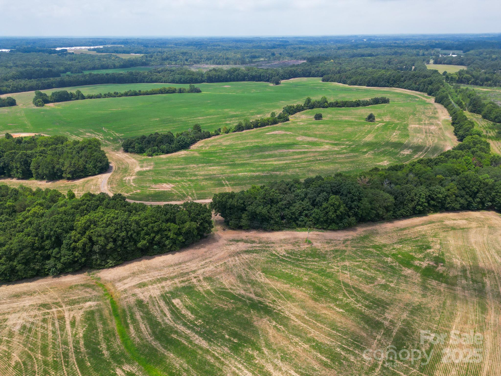 7602 Gus Eubanks Road Monroe, NC 28112 - Photo 9 of 22 a view of an outdoor space with a lake view