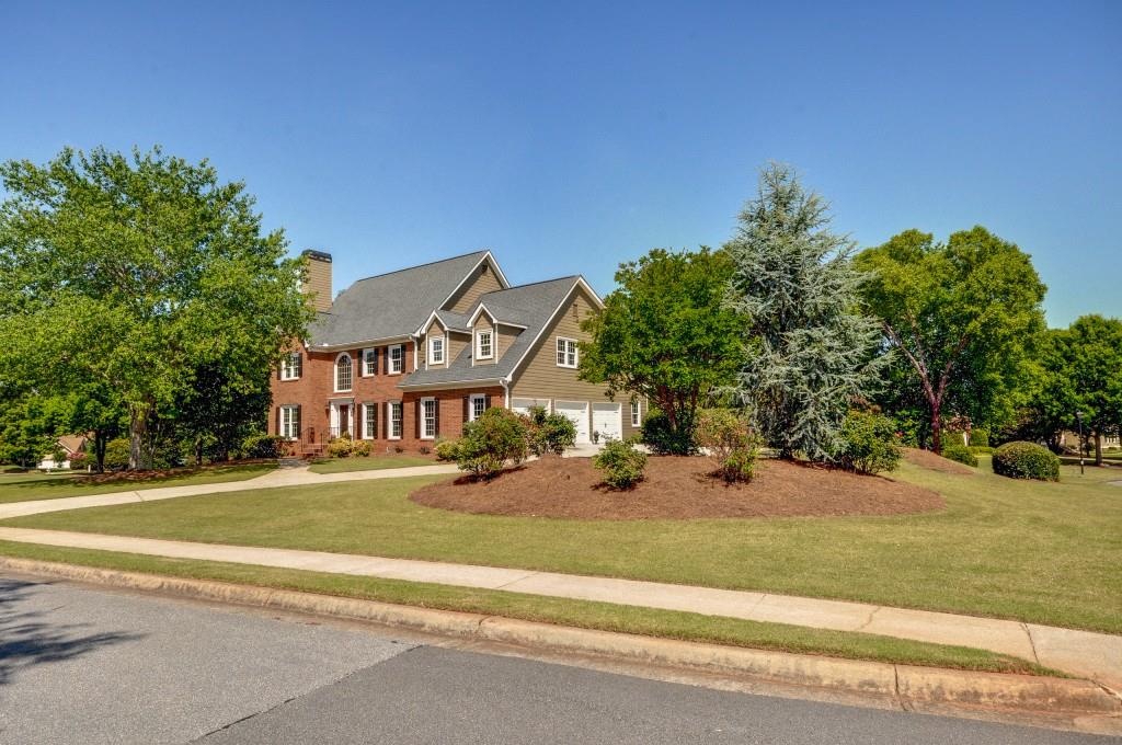 Gorgeous corner lot on cul-de-sac street in desirable Devereux Downs swim/tennis neighborhood!  Enjoy this social neighborhood with a level 1.4 mile loop of homes perfect for walking and riding bikes.  Convenient to Canton Street with restaurants and shop