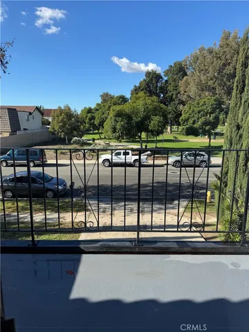 a view of swimming pool from a balcony