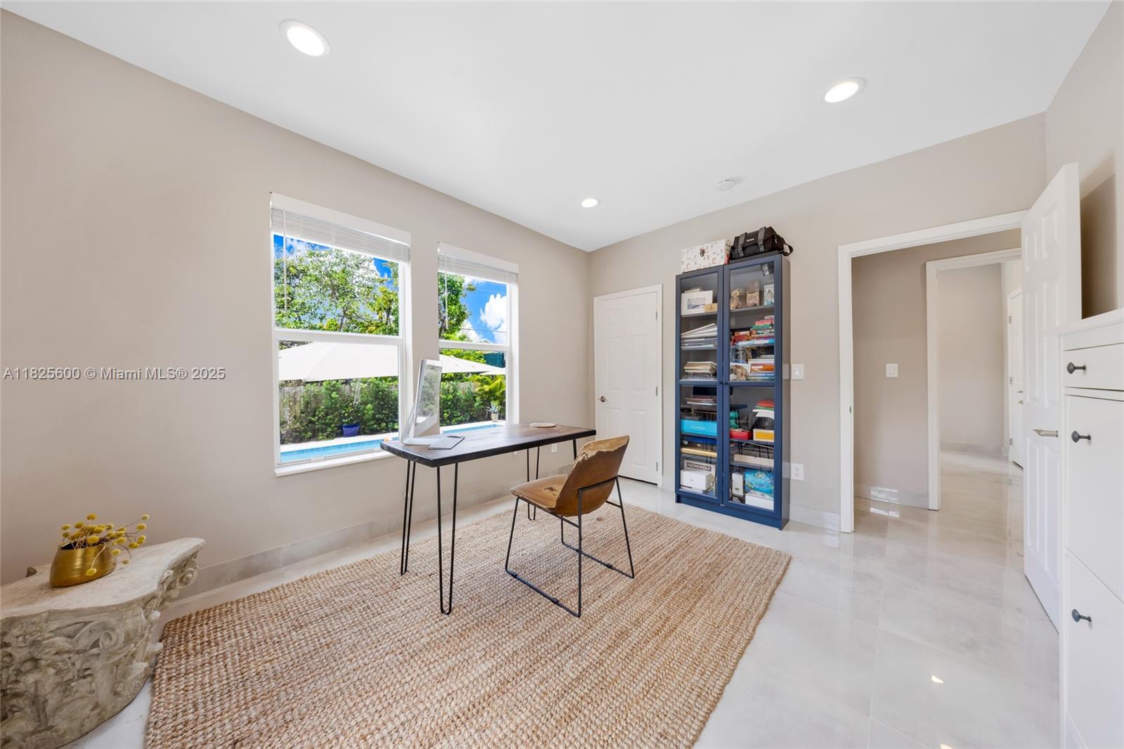 120 Northwest 49th Street Miami, FL 33127 - Photo 20 of 35 a workspace with furniture and window