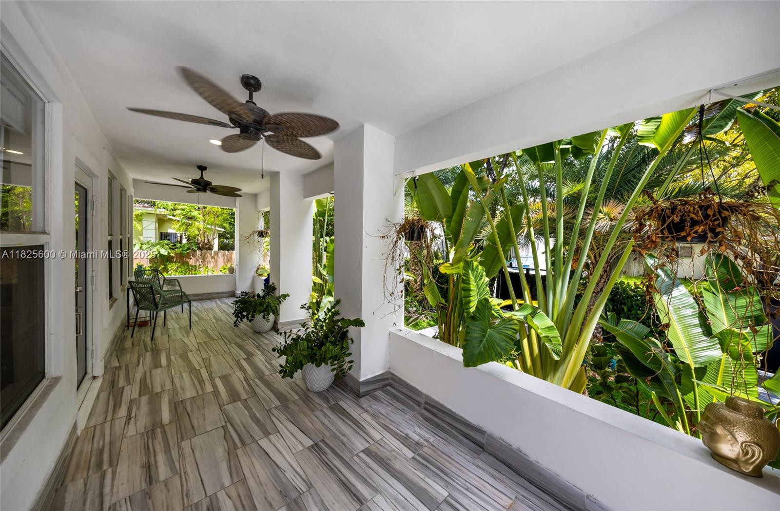 120 Northwest 49th Street Miami, FL 33127 - Photo 3 of 35 a view of outdoor space with wooden floor