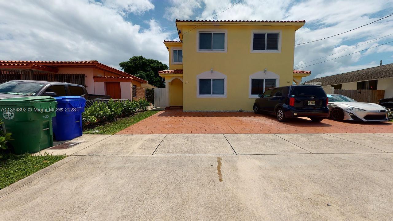 Kirkland Heights Miami, FL 33135 - Photo 1 of 11 a car parked in front of a house