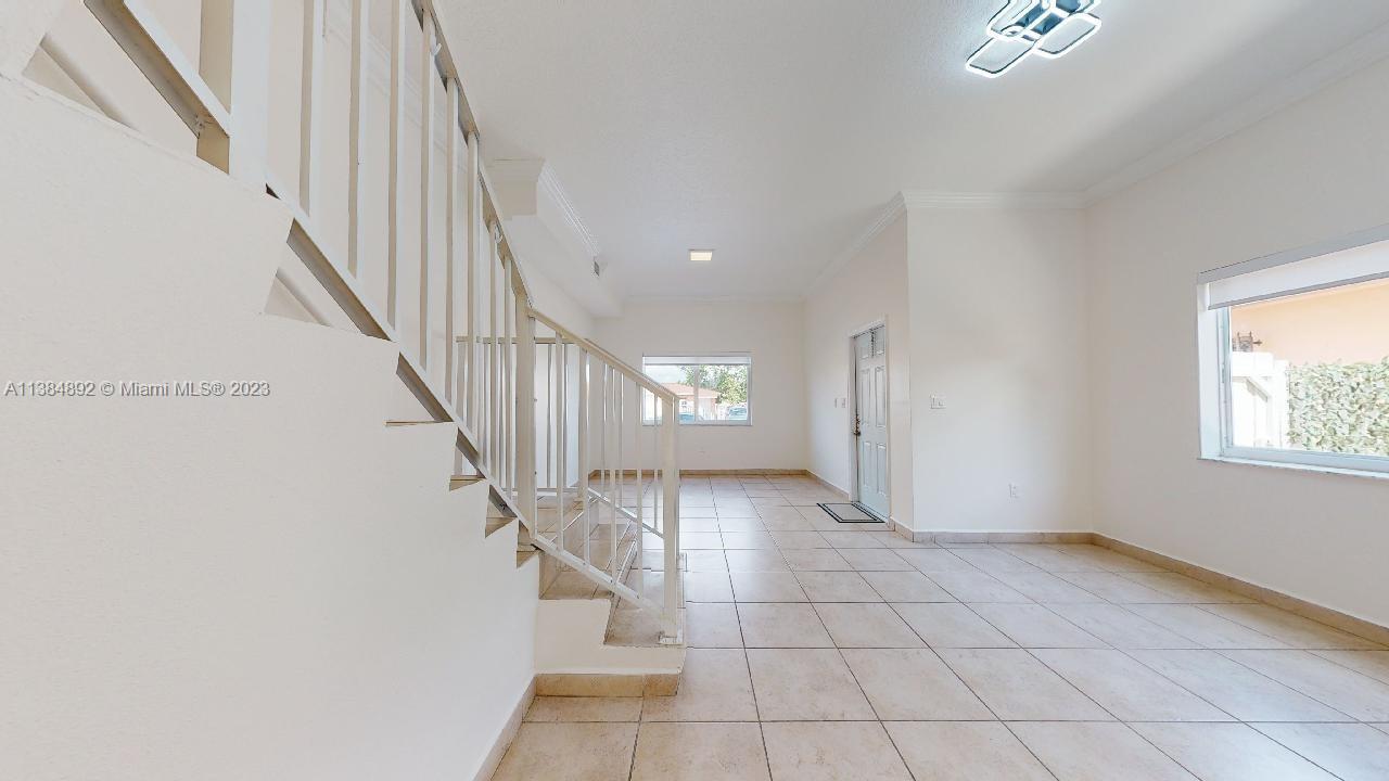 Kirkland Heights Miami, FL 33135 - Photo 2 of 11 a view of entryway and hall with a window