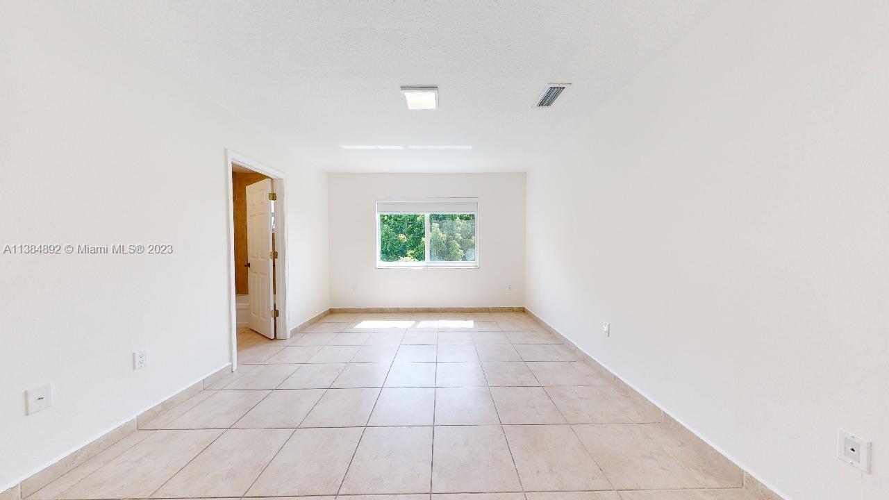 Kirkland Heights Miami, FL 33135 - Photo 8 of 11 a view of an empty room and window