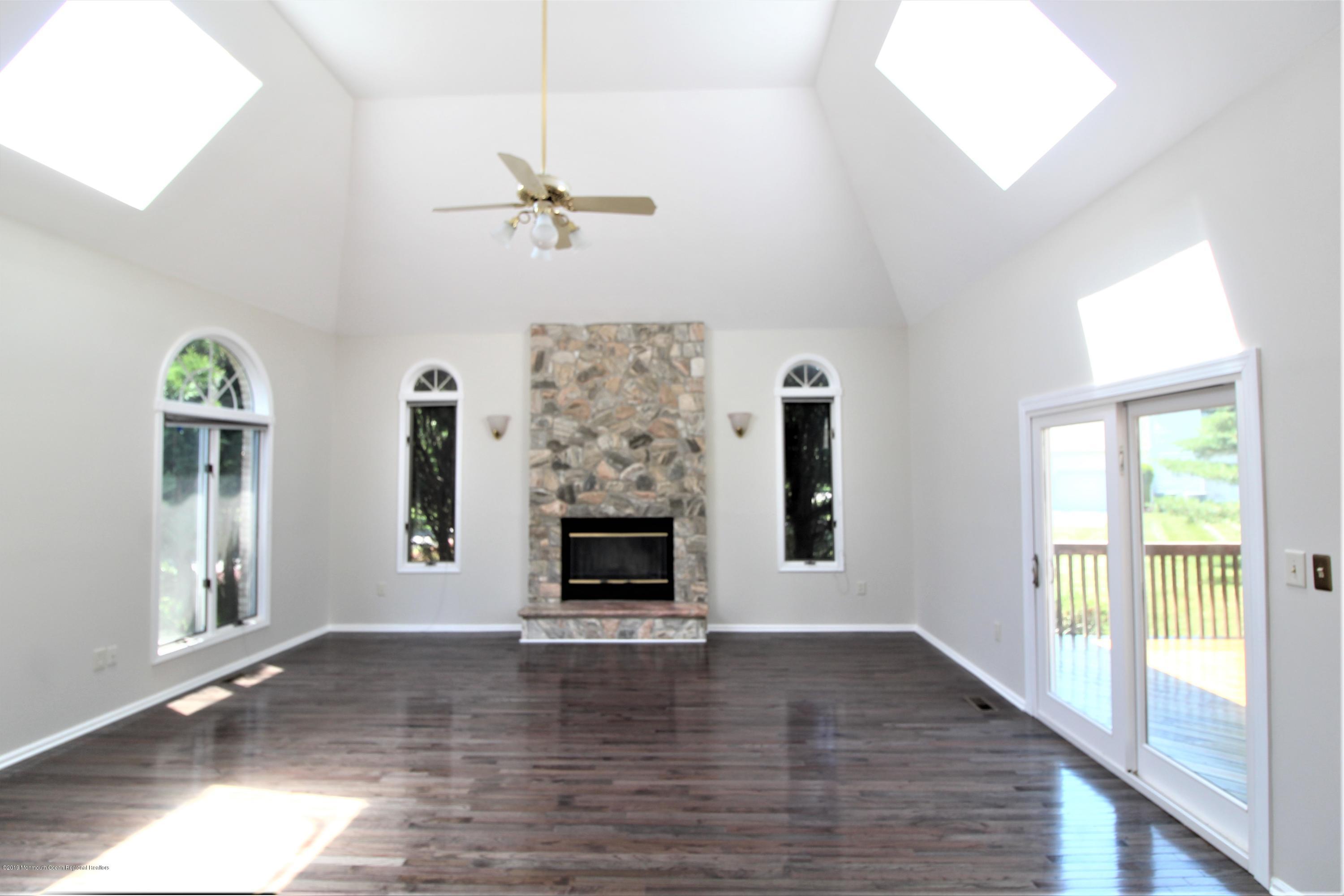 11 Falcon Ridge Circle Holmdel, NJ 07733 - Photo 11 of 31 IMG_5316 - family room