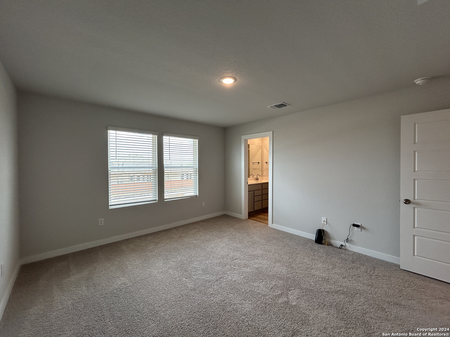 4305 Danforth Street New Braunfels, TX 78130 - Photo 16 of 31 a view of an empty room with a window