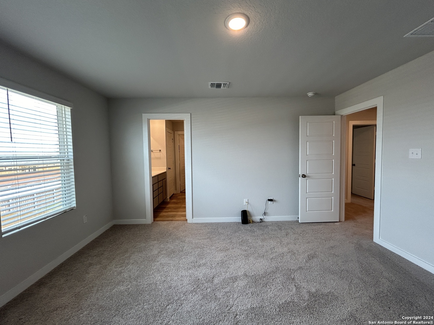 4305 Danforth Street New Braunfels, TX 78130 - Photo 17 of 31 a view of an empty room with a window