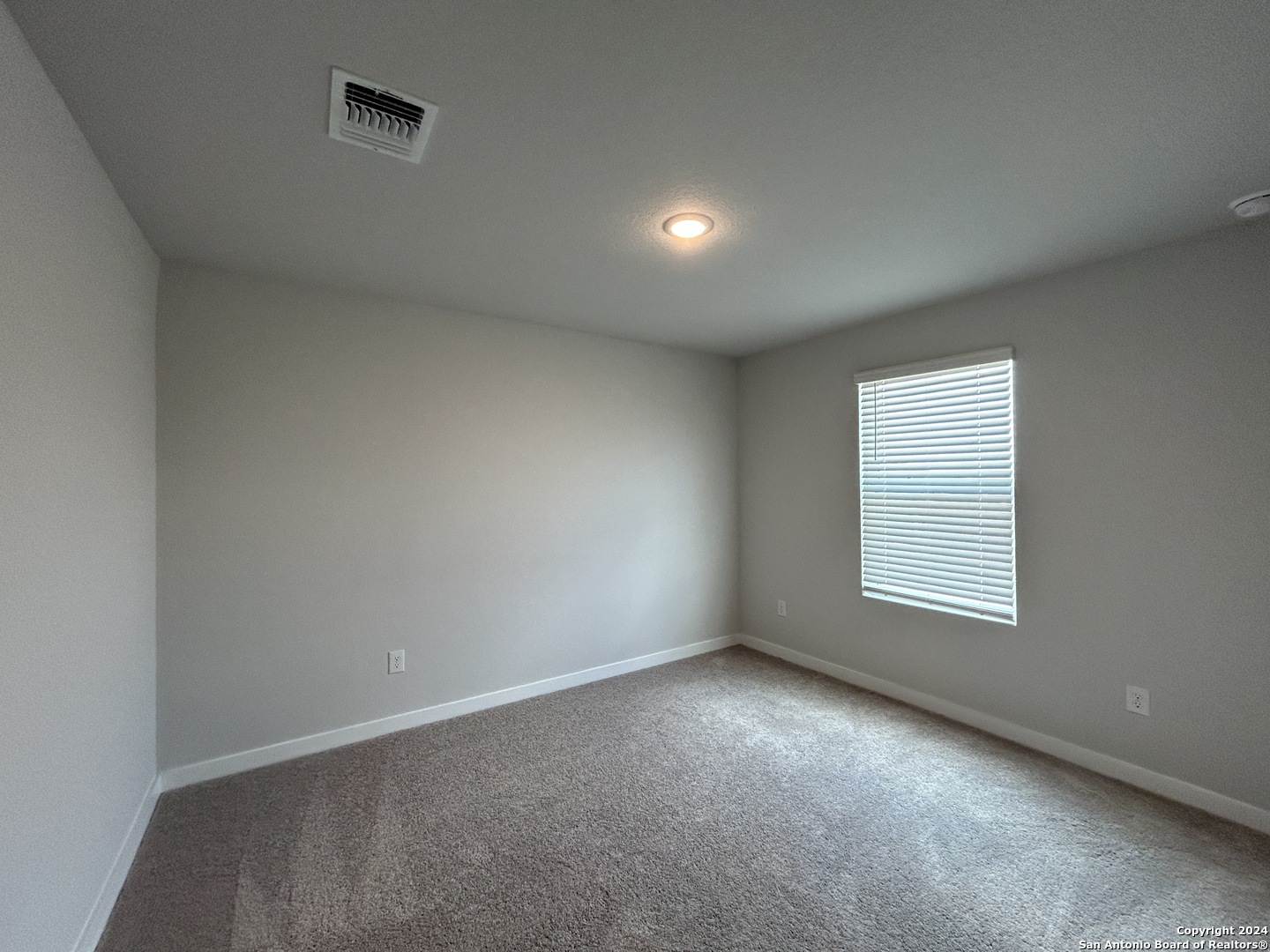 4305 Danforth Street New Braunfels, TX 78130 - Photo 20 of 31 an empty room with a window