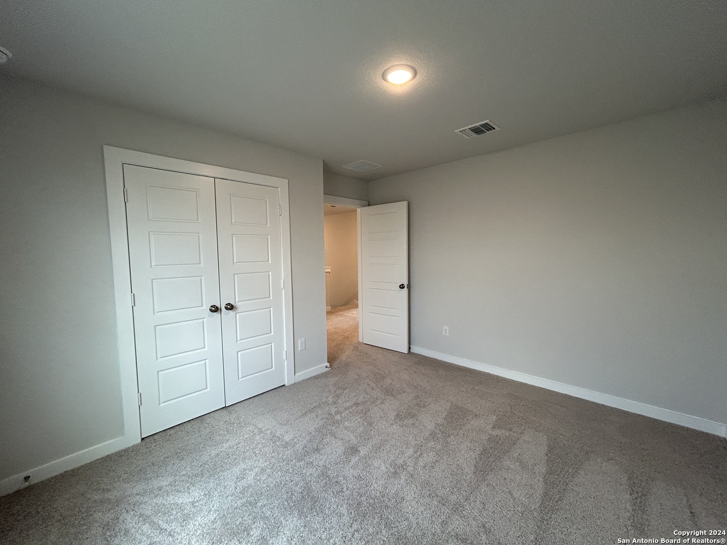 4305 Danforth Street New Braunfels, TX 78130 - Photo 22 of 31 a view of an empty room and closet area
