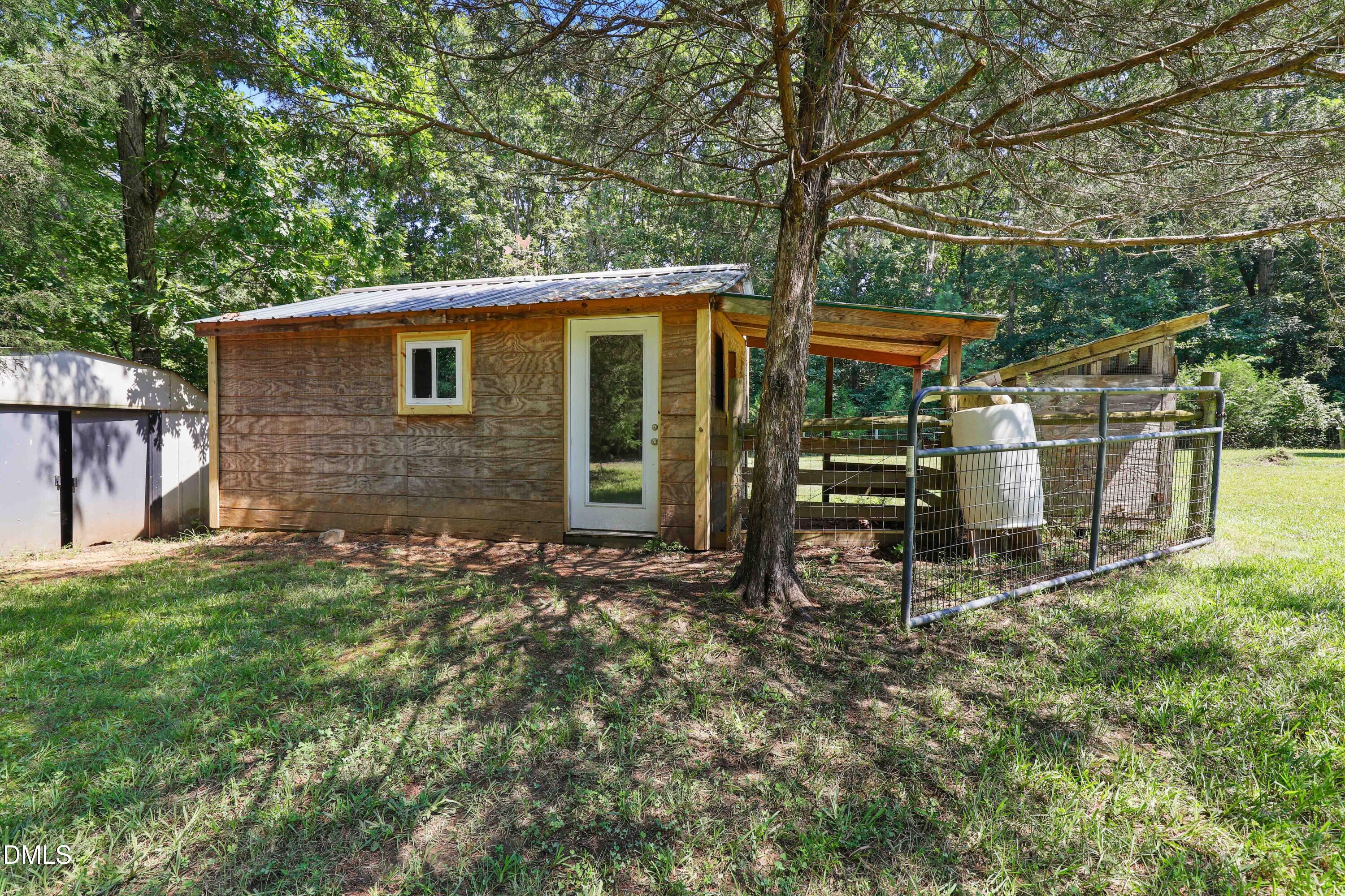 33 Holly Run Pittsboro, NC 27312 - Photo 38 of 46 a view of a house with backyard and sitting area