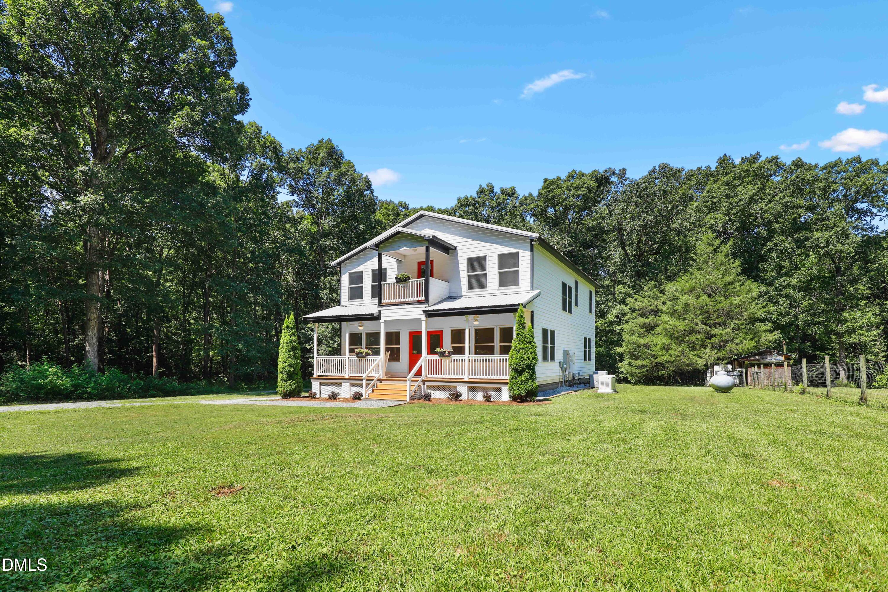 33 Holly Run Pittsboro, NC 27312 - Photo 43 of 46 a front view of house with yard and green space