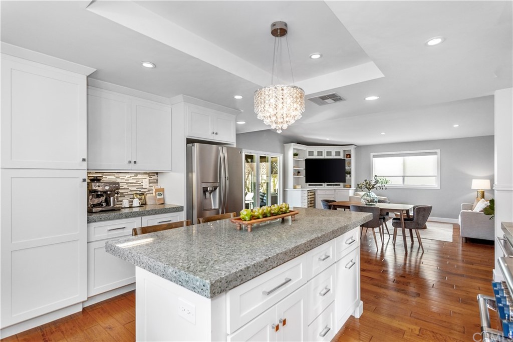 377 Flint Avenue Long Beach, CA 90814 - Photo 10 of 41 a kitchen with a table and chairs in it