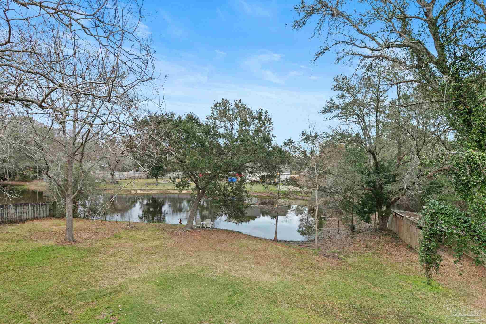 11424 High Springs Road Pensacola, FL 32534 - Photo 15 of 46 a view of house with a yard