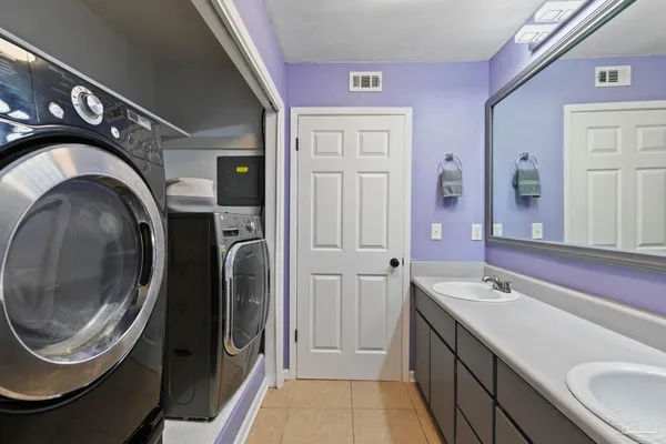 a bathroom with a shower a toilet and a shower