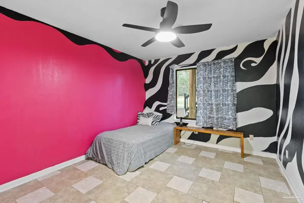 a view of empty room with furniture and wooden floor
