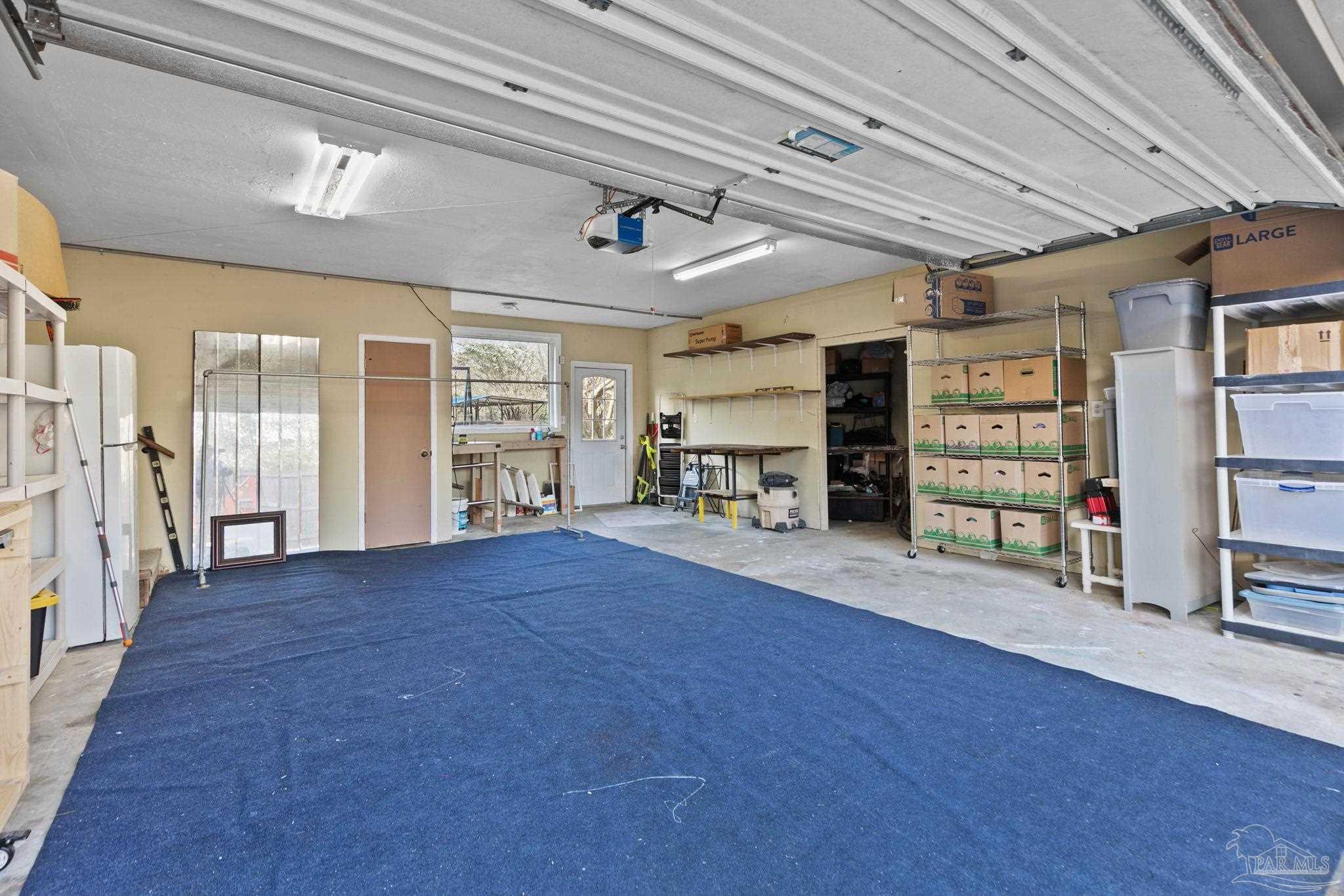 11424 High Springs Road Pensacola, FL 32534 - Photo 25 of 46 a view of empty room with furniture and wooden floor