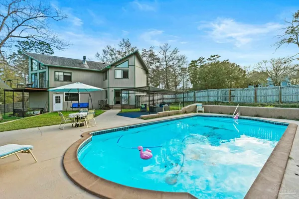 a view of a backyard with a garden