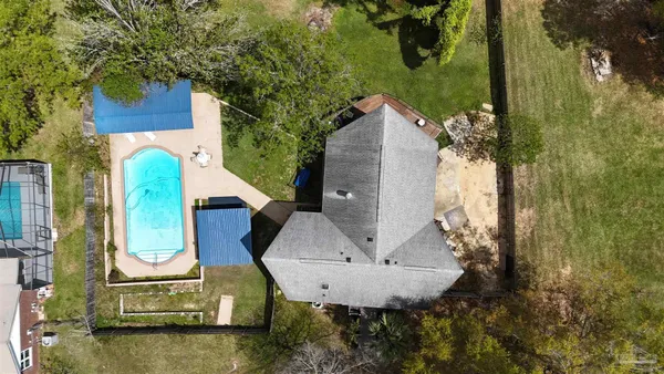 a view of a house with a swimming pool
