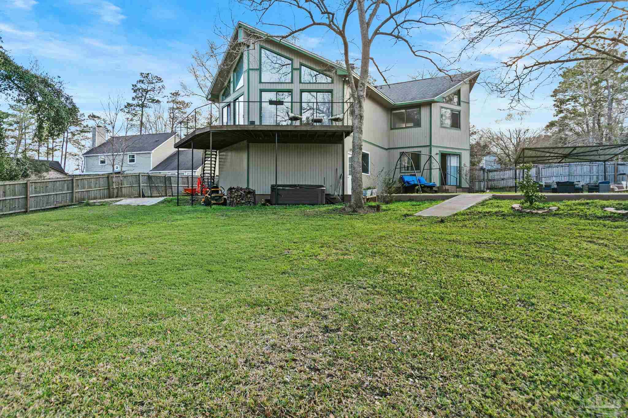 11424 High Springs Road Pensacola, FL 32534 - Photo 39 of 46 a view of a house with a yard and sitting area