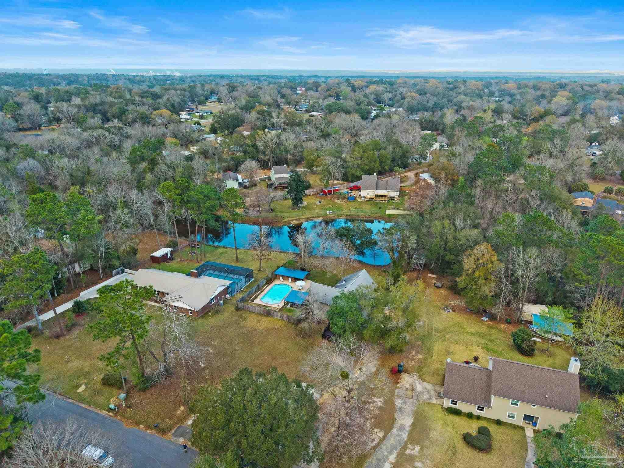 11424 High Springs Road Pensacola, FL 32534 - Photo 43 of 46 an aerial view of a houses with a yard