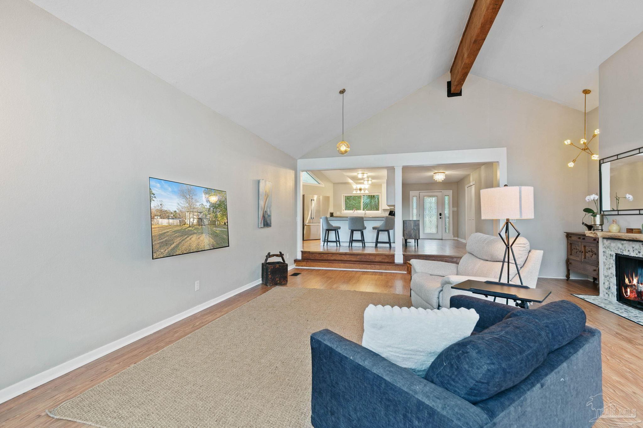 11424 High Springs Road Pensacola, FL 32534 - Photo 7 of 46 a living room with furniture and a large window