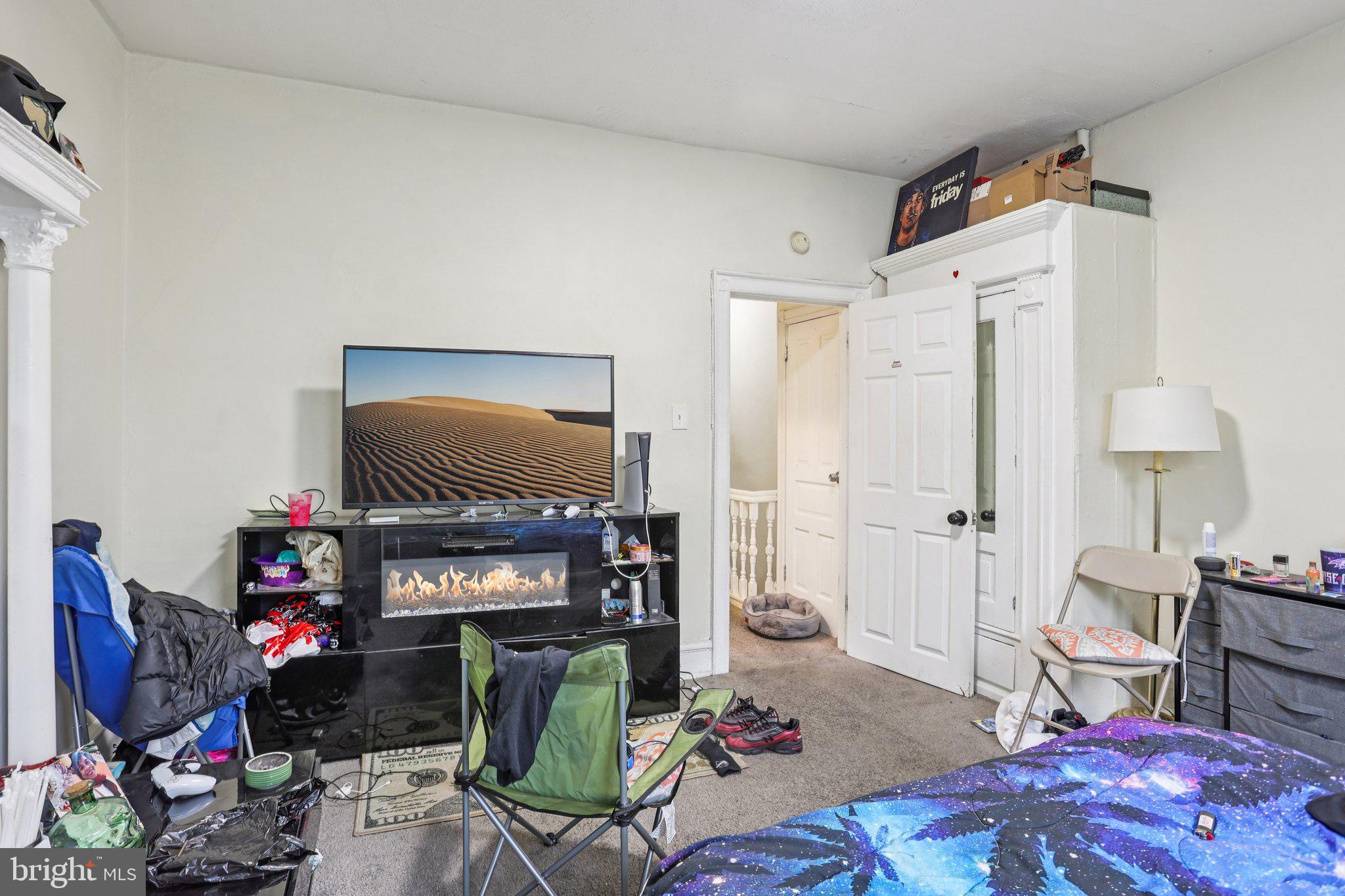 115 North Peach Street Philadelphia, PA 19139 - Photo 17 of 19 a living room with lots of furniture and a wooden floor