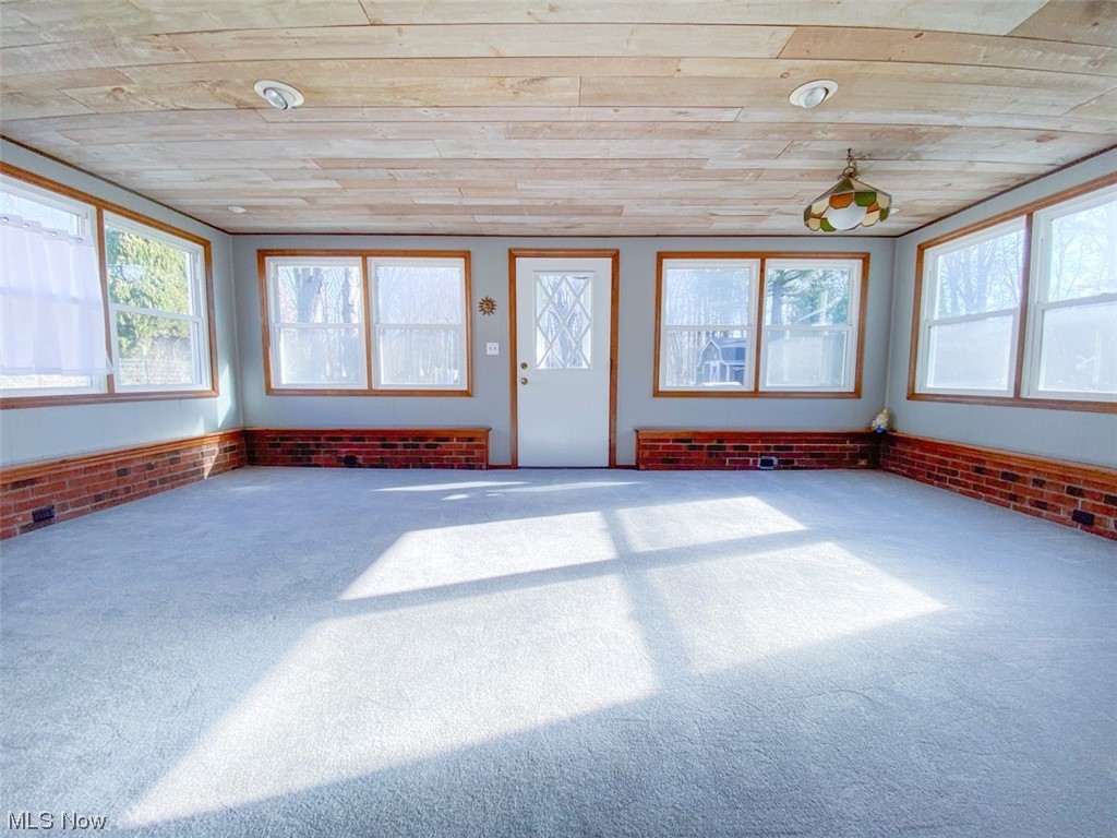 241 Jaycox Road Avon Lake, OH 44012 - Photo 11 of 26 sunroom featuring wooden ceiling and new carpeting