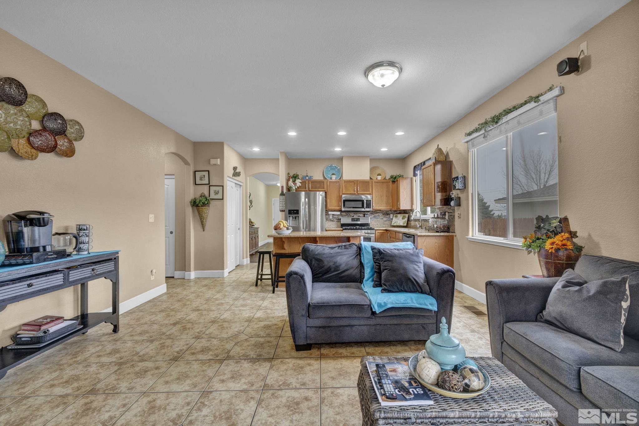 2721 Harding Way Reno, NV 89503 - Photo 12 of 40 a living room with furniture and a view of kitchen