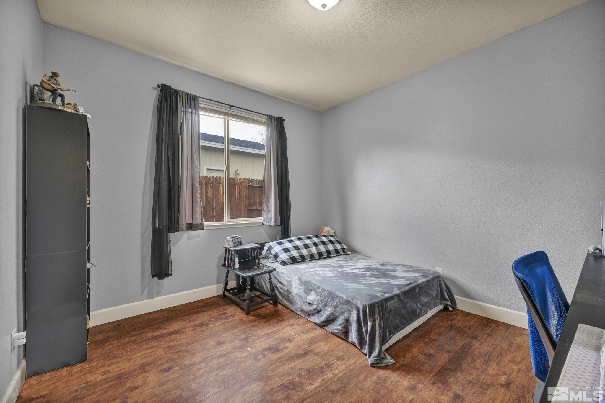 2721 Harding Way Reno, NV 89503 - Photo 22 of 40 a living room with furniture and a window