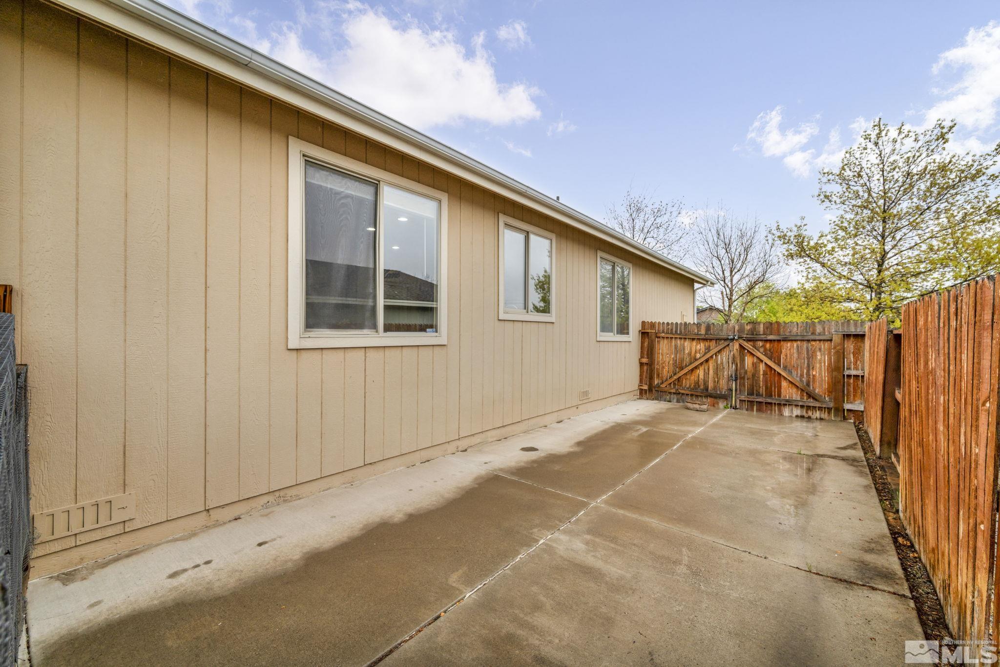 2721 Harding Way Reno, NV 89503 - Photo 31 of 40 a view of a house with a backyard