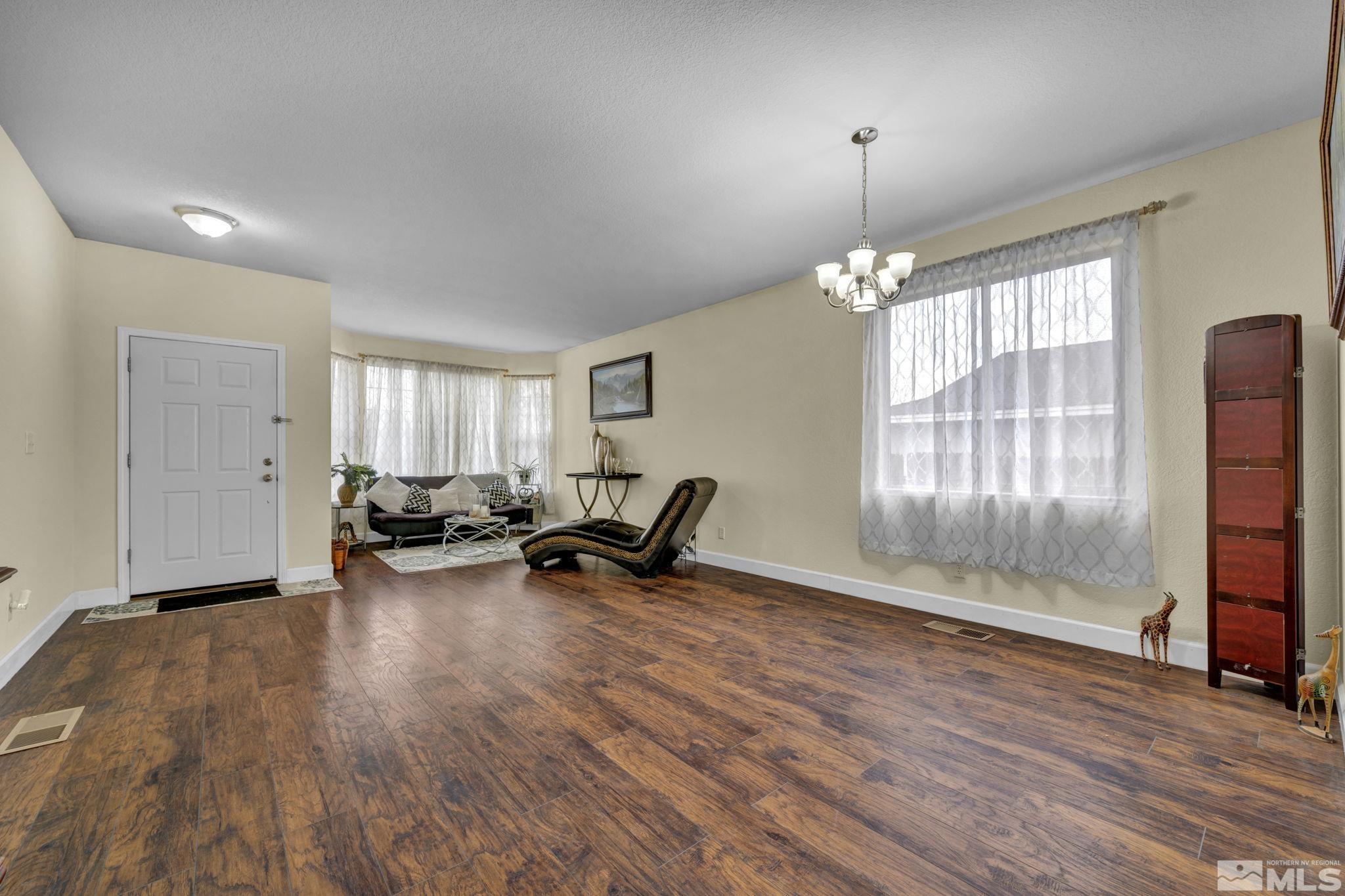 2721 Harding Way Reno, NV 89503 - Photo 5 of 40 a view of a livingroom with patio and a window