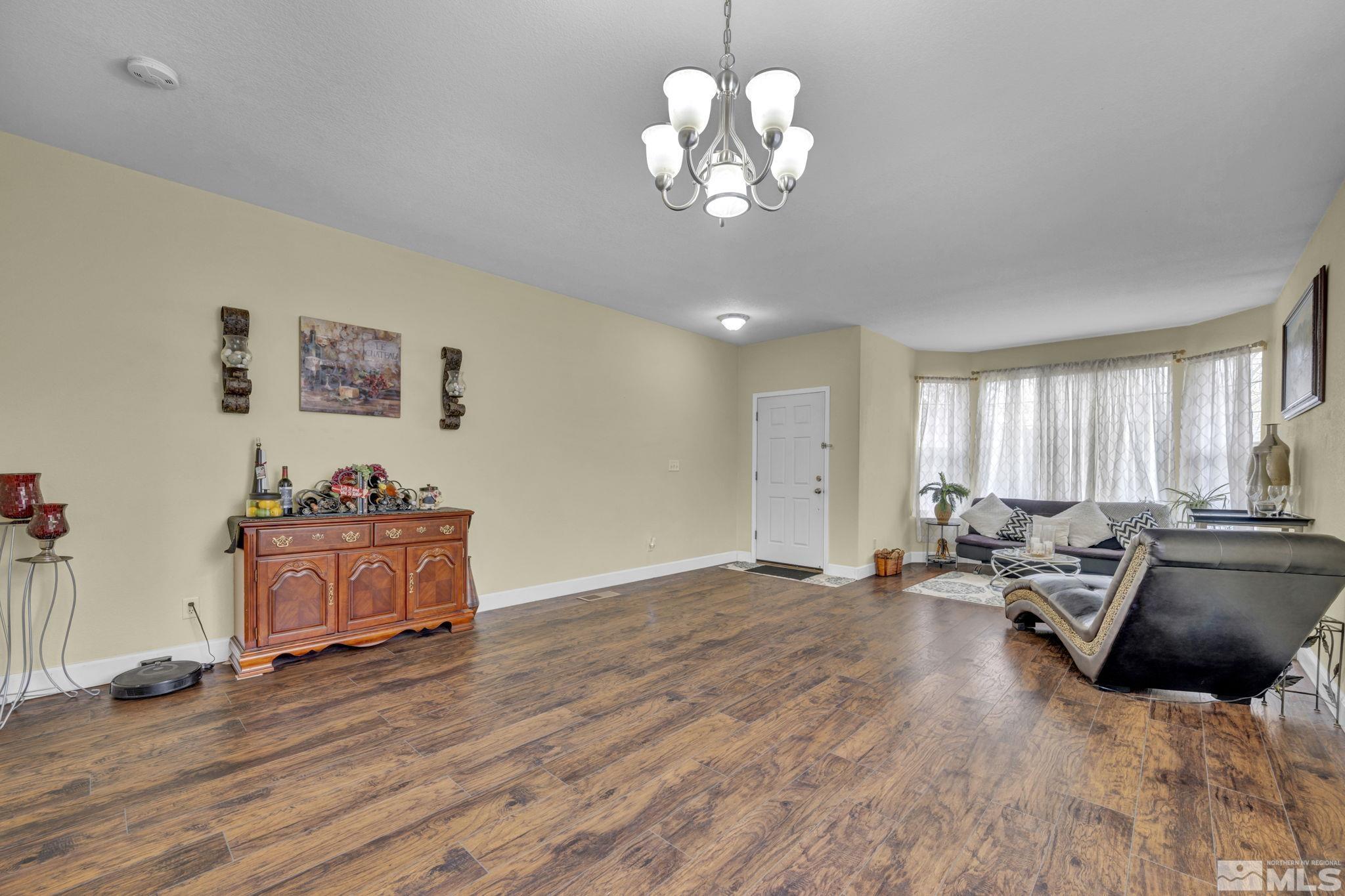 2721 Harding Way Reno, NV 89503 - Photo 6 of 40 a living room with hard wood flooring and furniture