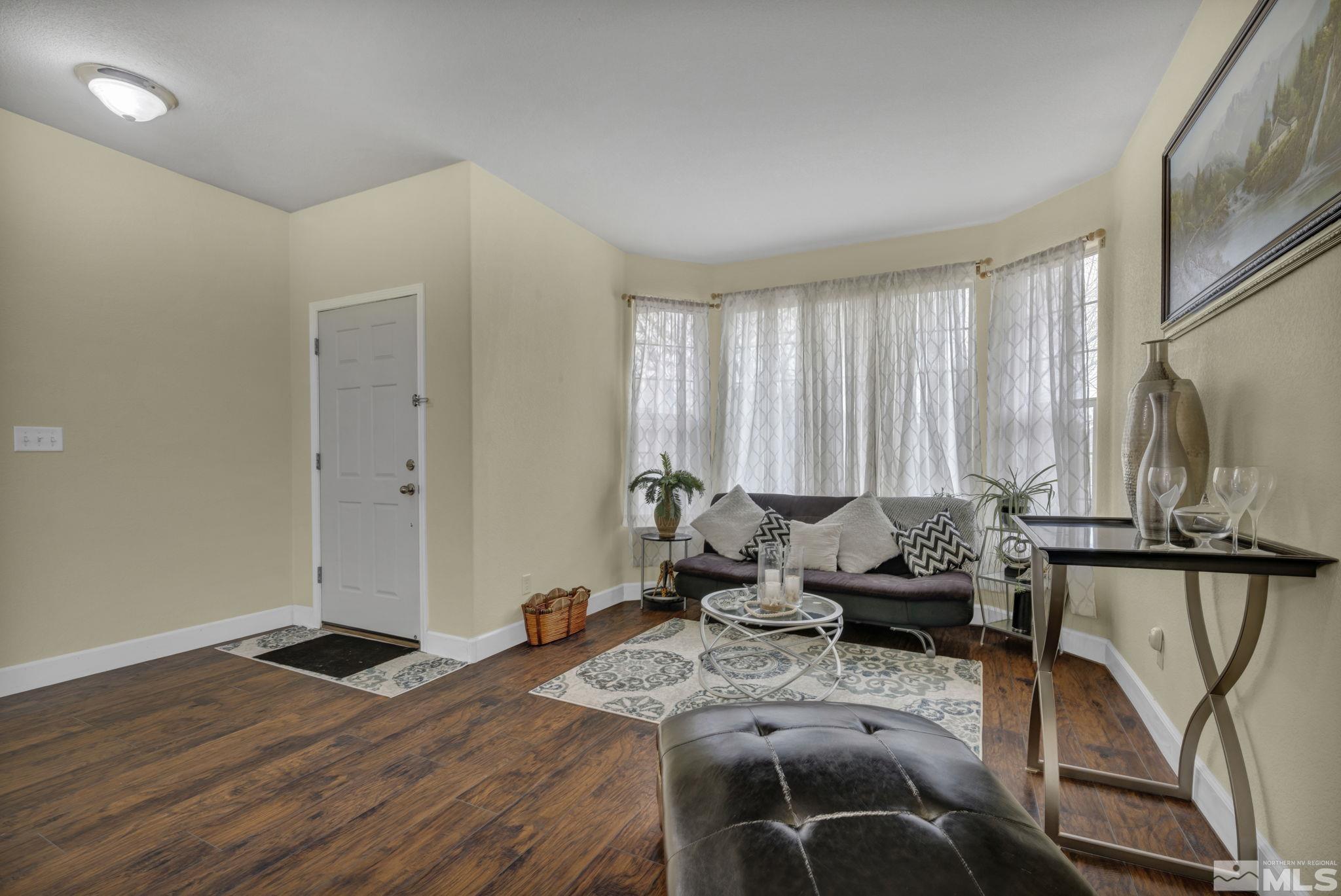 2721 Harding Way Reno, NV 89503 - Photo 9 of 40 a living room with furniture window and wooden floor