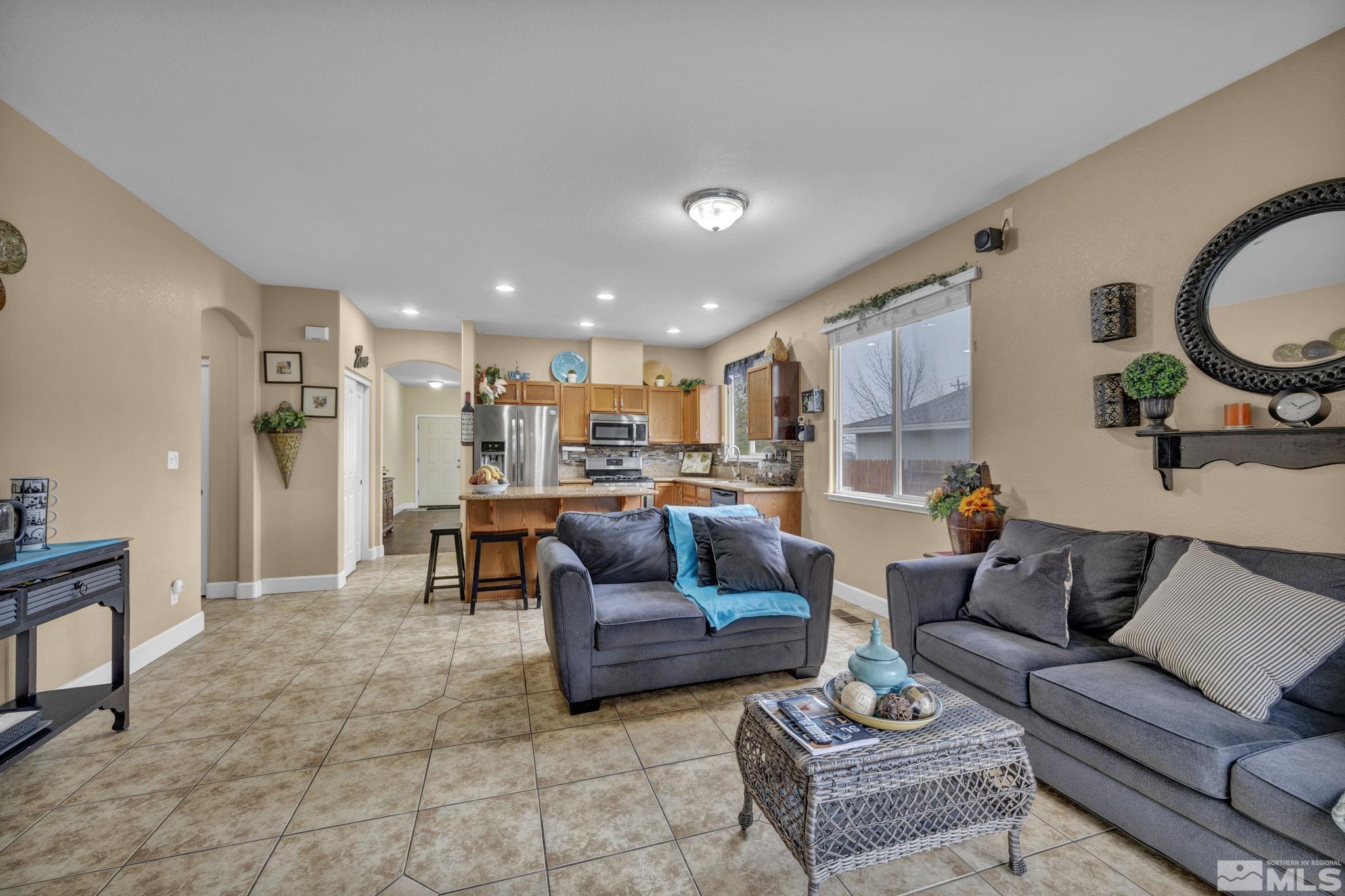 2721 Harding Way Reno, NV 89503 - Photo 10 of 40 a living room with furniture and a view of kitchen