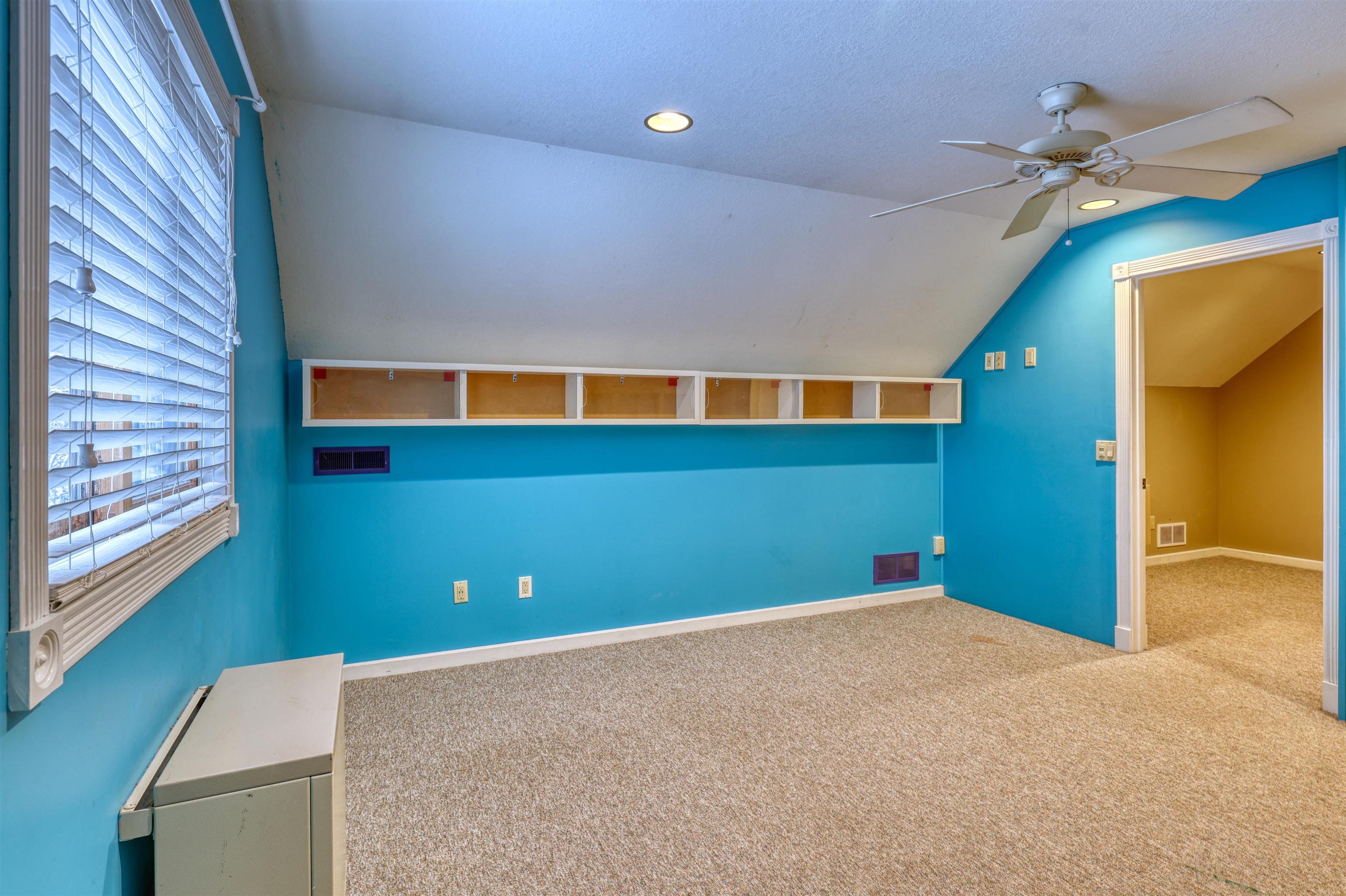 15531 West Hospital Road Hayward, WI 54843 - Photo 51 of 71 Additional living space with carpet floors, vaulted ceiling, ceiling fan, and recessed lighting