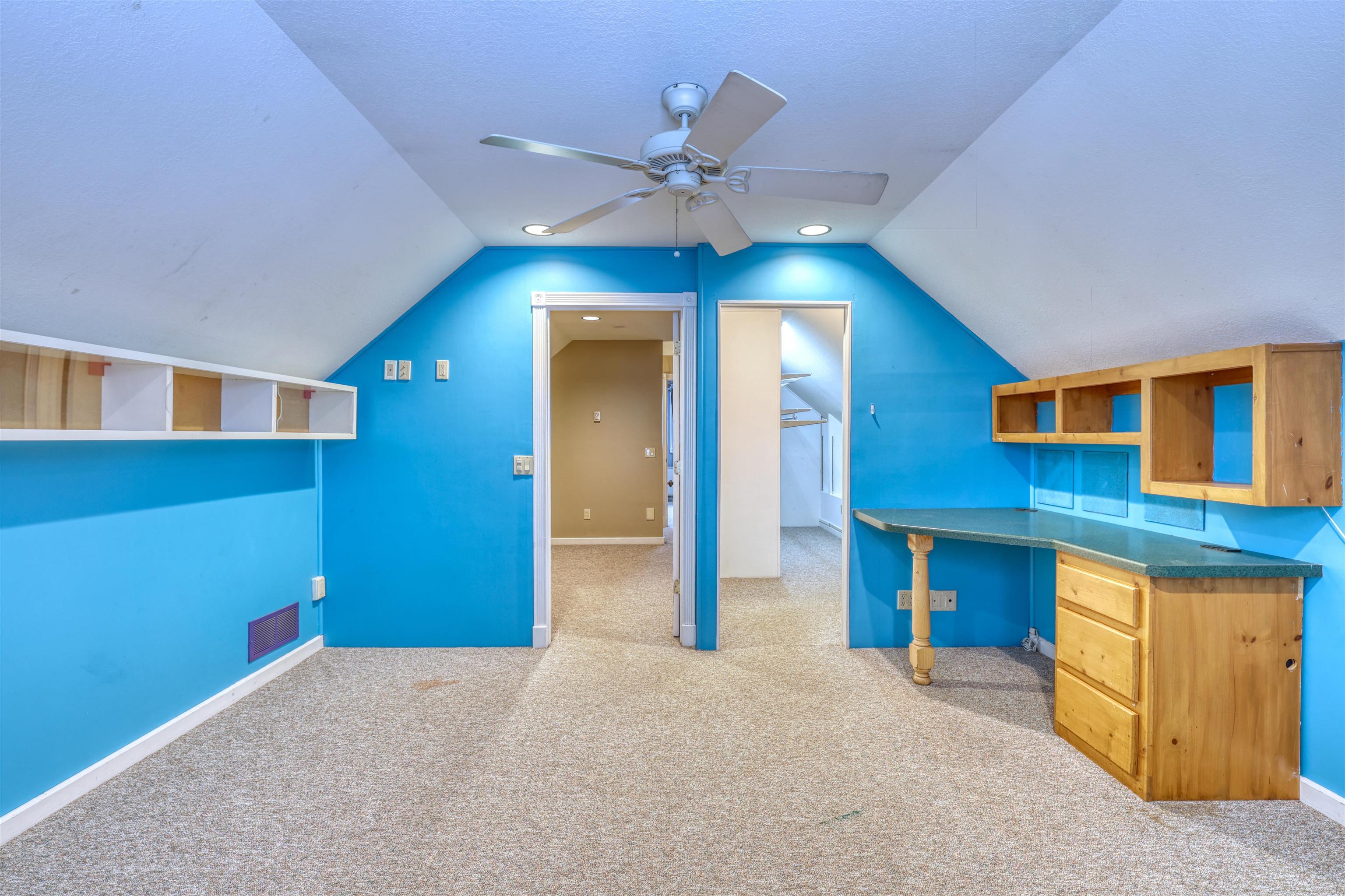 15531 West Hospital Road Hayward, WI 54843 - Photo 52 of 71 Additional living space with light carpet, lofted ceiling, and ceiling fan
