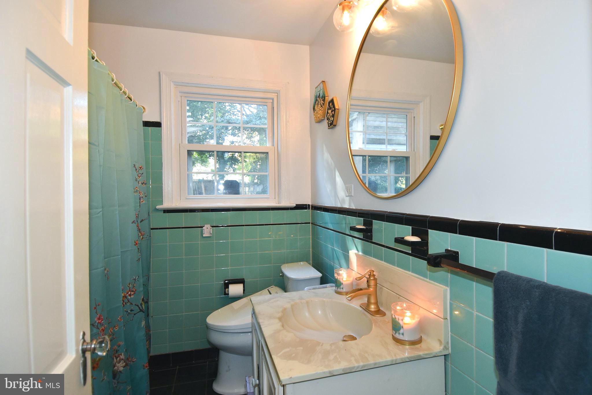 2116 Seminary Road Silver Spring, MD 20910 - Photo 16 of 33 Classic main level full bathroom with updates.