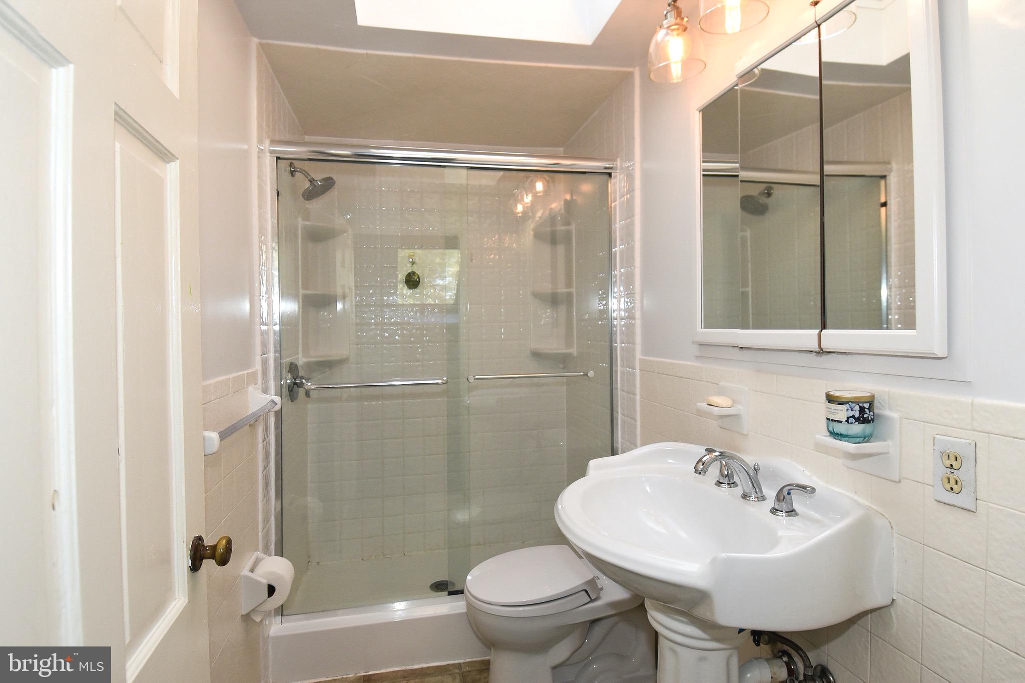 2116 Seminary Road Silver Spring, MD 20910 - Photo 23 of 33 Bright upper level bathroom with skylight.