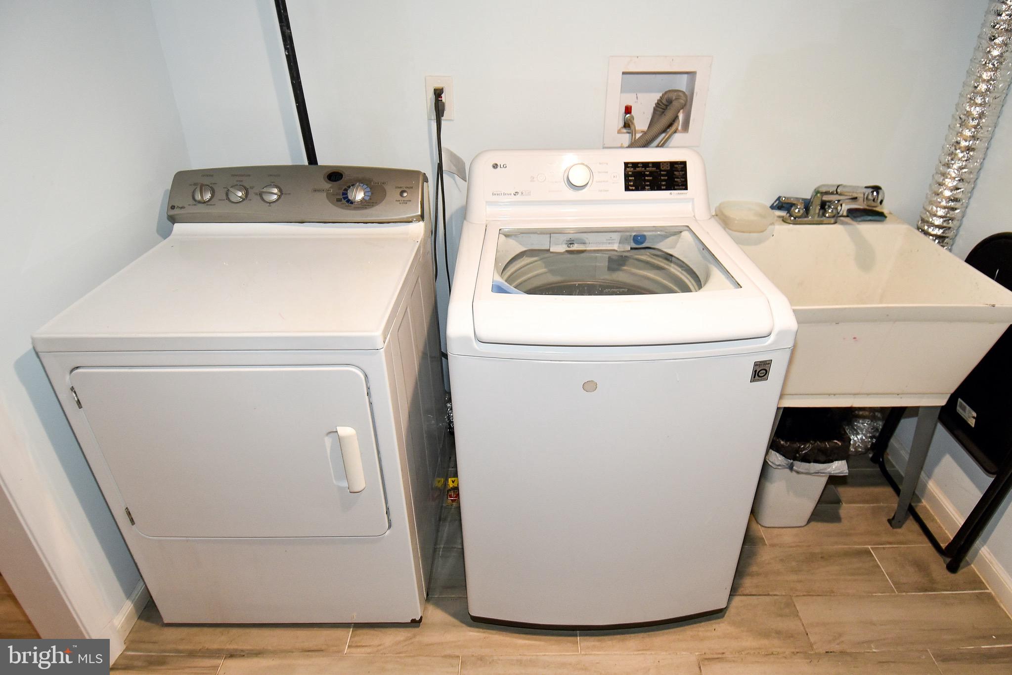2116 Seminary Road Silver Spring, MD 20910 - Photo 28 of 33 Separate laundry room with W/D & utility sink.